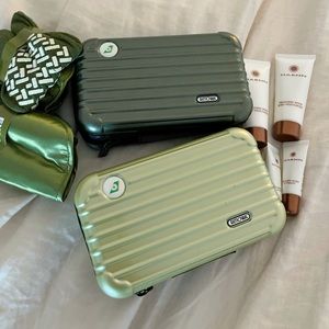 Rimowa Pair of Green Air Fly Amenity Kits